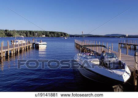 New Hampshire, Wolfeboro, NH, Boats docked at a pier on scenic Lake Winnipesaukee in Wolfeboro one of the oldest summer resorts in America. View Large Photo Image Stock Image - New Hampshire, Wolfeboro, NH, Boats docked at a pier on scenic Lake Winnipesaukee in Wolfeboro one of the oldest summer resorts in America.. Fotosearch