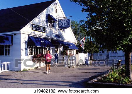Stock Image -  New Hampshire, Wolfeboro, NH, PJ's Dockside Restaurant on Lake Winnipesaukee in Wolfeboro one of the oldest summer resorts in America.. Fotosearch