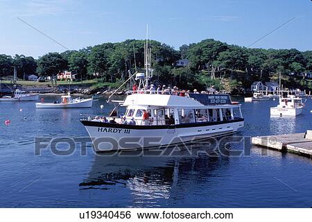 Stock Photograph -  New Harbor, Maine, ME, Pemaquid, Hardy III tourboat cruise in the harbor. . Fotosearch