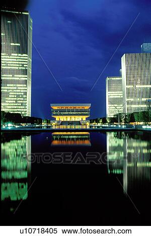 New York State Museum, Albany, New York, Reflection of the New York State Museum in the pool at the Governor Nelson A. Rockefeller Empire State Plaza illuminated at night in Albany, New York. View Large Photo Image Stock Photography - New York State Museum, Albany, New York, Reflection of the New York State Museum in the pool at the Governor Nelson A. Rockefeller Empire State Plaza illuminated at night in Albany, New York. . Fotosearch