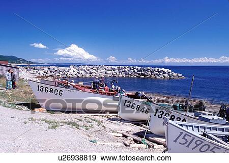 Newfoundland, NF, Canada, Fishing boats on the beach at Cape St. George on St. George's Bay at Port au Port Peninsula on Gulf of St. Lawrence. View Large Photo Image Stock Photo - Newfoundland, NF, Canada, Fishing boats on the beach at Cape St. George on St. George's Bay at Port au Port Peninsula on Gulf of St. Lawrence.. Fotosearch