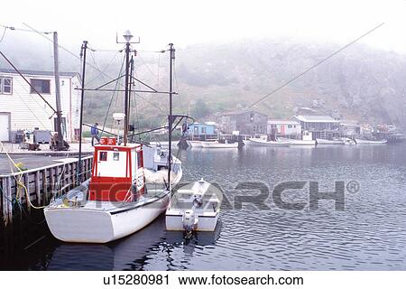 Stock Image -  Newfoundland, NF, St. John's, Canada, Quidi Vidi Village a 17th century fishing village in St. John's in the fog. Atlantic Ocean. Fotosearch