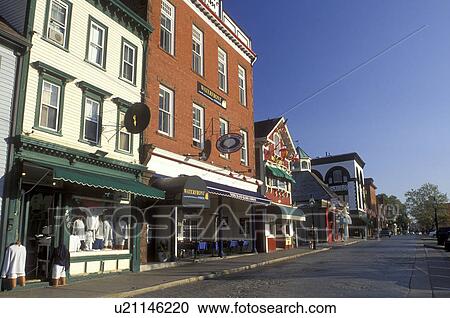 Stock Image -  Newport, Rhode Island, RI, Shops along Thames Street in downtown Newport in the autumn.. Fotosearch