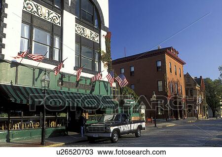 Stock Image -  Newport, RI, Rhode Island, Shops along Thames Street in downtown Newport in the autumn.. Fotosearch
