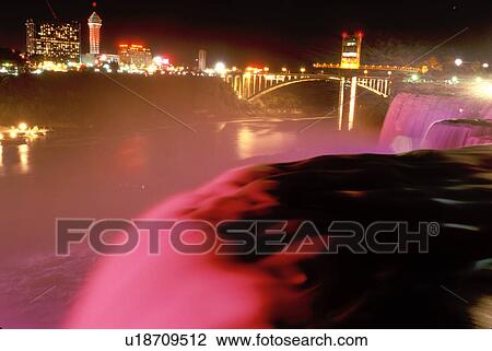 Stock Image -  Niagara Falls, New York, NY, waterfall, American Falls, illumination, night, Niagara Falls . Fotosearch