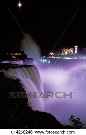 Stock Photograph -  Niagara Falls, NY, waterfalls, New York, American Falls illuminated at night at Niagara Falls. . Fotosearch