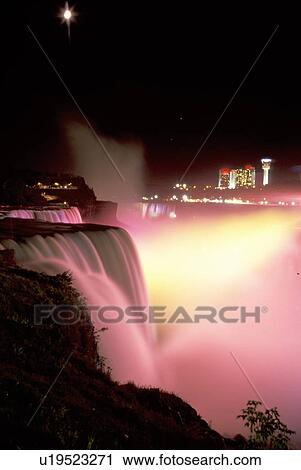 Stock Image -  Niagara Falls, NY, waterfalls, illumination, New York, American Falls illuminated at night at Niagara Falls. . Fotosearch