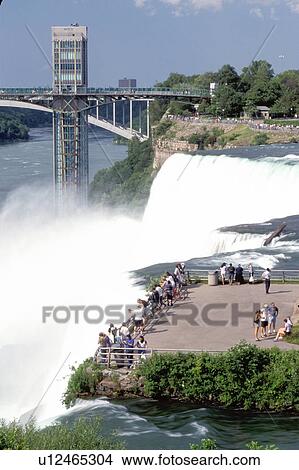 Niagara Falls, waterfall, NY, New York, People at the overlook at the American Falls. View Large Photo Image Picture -  Niagara Falls, waterfall, NY, New York, People at the overlook at the American Falls.. Fotosearch