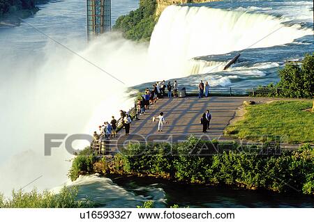 Stock Photo -  Niagara Falls, waterfall, NY, New York, People at the overlook at the American Falls.. Fotosearch