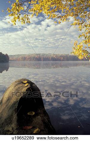 North Carolina, NC, Clouds reflect in the calm waters of Price Lake at Julian Price Memorial Park in the fall View Large Photo Image Stock Photo - North Carolina, NC, Clouds reflect in the calm waters of Price Lake at Julian Price Memorial Park in the fall . Fotosearch