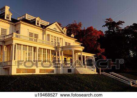 Stock Photo -  North Carolina, NC, Morning light on Cone Manor House in Moses H. Cone Memorial Park in the fall., . Fotosearch