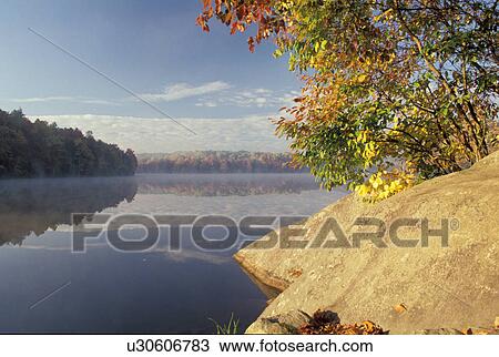 North Carolina, NC, Reflection in the calm waters of Price Lake at Julian Price Memorial Park in the fall., View Large Photo Image Stock Image - North Carolina, NC, Reflection in the calm waters of Price Lake at Julian Price Memorial Park in the fall., . Fotosearch
