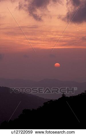 Stock Photo -  North Carolina, NC, Sunrise from the Blue Ridge Parkway near Grandfather Mountain . Fotosearch