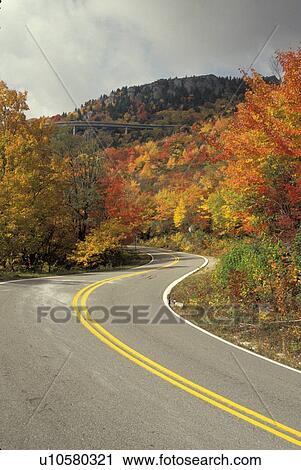 Stock Image -  North Carolina, road, NC, View of Linn Cove Viaduct on the Blue Ridge Parkway in the fall.. Fotosearch