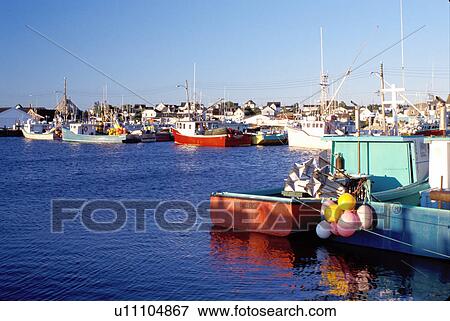 Stock Photo -  Nova Scotia, Cape Sable Island, NS, Canada, Fishing boats docked in Clark's Harbor on Cape Sable Island on the Atlantic Ocean. . Fotosearch
