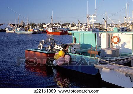Nova Scotia, Cape Sable Island, NS, Canada, Fishing boats docked in Clark's Harbor on Cape Sable Island on the Atlantic Ocean.  View Large Photo Image Stock Photo -  Nova Scotia, Cape Sable Island, NS, Canada, Fishing boats docked in Clark's Harbor on Cape Sable Island on the Atlantic Ocean. . Fotosearch