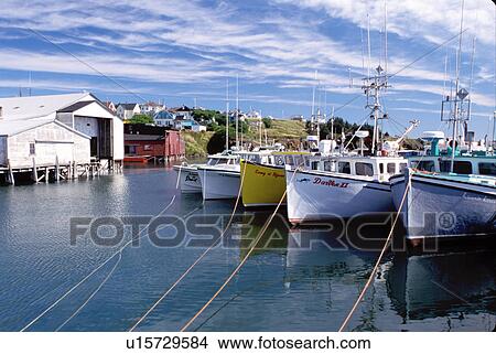 Picture -  Nova Scotia, Cape St. Mary, NS, Canada, Fishing boats docked in St. Mary's Bay on Cape St. Mary on the Atlantic Ocean. . Fotosearch