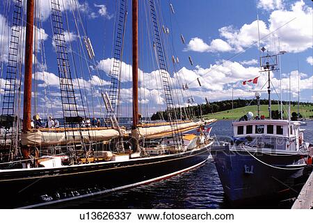 Nova Scotia, Lunenburg, NS, Canada, Ship exhibit at the Fisheries Museum of the Atlantic at the scenic village of Lunenburg, UNESCO World Heritage Site, on the Atlantic Ocean. View Large Photo Image Stock Photo - Nova Scotia, Lunenburg, NS, Canada, Ship exhibit at the Fisheries Museum of the Atlantic at the scenic village of Lunenburg, UNESCO World Heritage Site, on the Atlantic Ocean. . Fotosearch