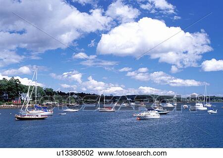 Stock Image -  Nova Scotia, NS, Canada, Boats buoyed on Mahone Bay on the Atlantic Ocean. . Fotosearch