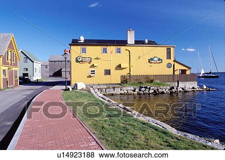 Stock Photo -  Nova Scotia, Shelburne, NS, Canada, Historic Shipbuilding Center in Shelburne on the Atlantic Ocean. . Fotosearch