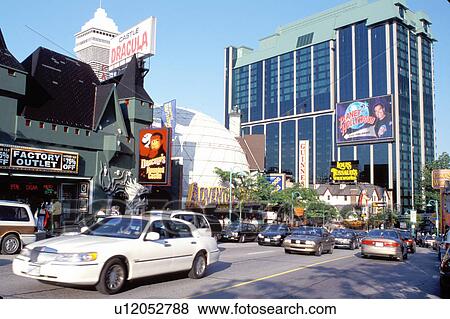 Stock Photo -  Ontario, Canada, Niagara Falls, Amusements along the main street in Niagara Falls.. Fotosearch