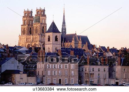 Orleans, France, Loire Valley, Loire Castle Region, Loiret, Centre, Europe, A view of the town of Orleans and Cathedral Ste. -Croix from the Loire River at sunset. View Large Photo Image Picture - Orleans, France, Loire Valley, Loire Castle Region, Loiret, Centre, Europe, A view of the town of Orleans and Cathedral Ste. -Croix from the Loire River at sunset.. Fotosearch