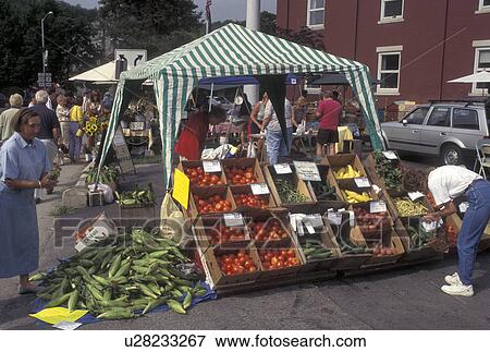 Stock Photo -  outdoor market, Vermont, VT, A produce stand at the Saturday Farmers Market in Montpelier.. Fotosearch