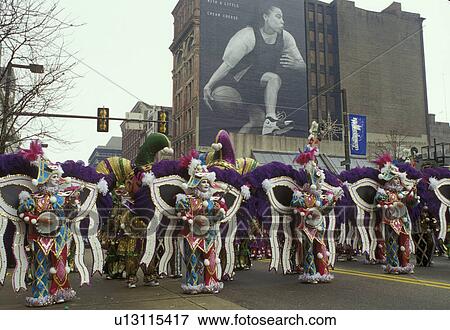 parade, band, costume, clown, Philadelphia, PA, Pennsylvania, Members of a String Band dressed in ornate court jester costumes play their banjos in the Mummers Day Parade on New Years Day in Philadelphia. View Large Photo Image Stock Photo - parade, band, costume, clown, Philadelphia, PA, Pennsylvania, Members of a String Band dressed in ornate court jester costumes play their banjos in the Mummers Day Parade on New Years Day in Philadelphia.. Fotosearch