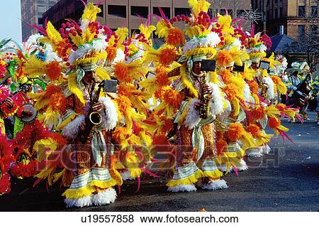 parade, band, costume, Philadelphia, PA, Pennsylvania, Members of a String Band dressed in fancy colorful costumes with feathers play their instruments and strut in the Mummers Day Parade on New Years Day in Philadelphia. View Large Photo Image Stock Photo - parade, band, costume, Philadelphia, PA, Pennsylvania, Members of a String Band dressed in fancy colorful costumes with feathers play their instruments and strut in the Mummers Day Parade on New Years Day in Philadelphia.. Fotosearch