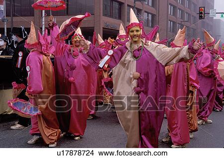 Picture -  parade, Philadelphia, PA, Pennsylvania, Men in the Comic Division dressed in clown costumes in the Mummers Day Parade on New Years Day in Philadelphia.. Fotosearch