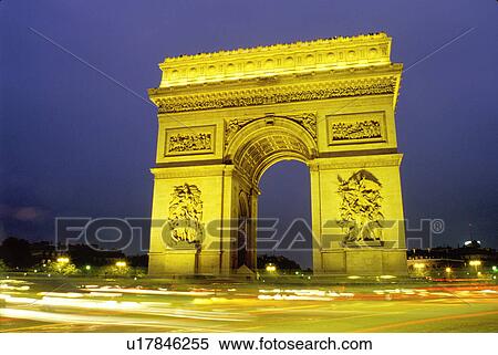 Paris, Arc de Triomphe, France, Europe, Arc de Triomphe at Place Charles de Gaulle illuminated at night in Paris. Headlights of traffic passing around the base of the arc. View Large Photo Image Stock Photography - Paris, Arc de Triomphe, France, Europe, Arc de Triomphe at Place Charles de Gaulle illuminated at night in Paris. Headlights of traffic passing around the base of the arc.. Fotosearch