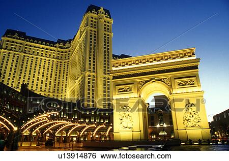 Stock Photograph -  Paris Casino & Resort, Las Vegas, Nevada, NV, Replica of the Arc de Triomphe and other landmarks at Paris Las Vegas Resort & Casino on The Strip at night in Las Vegas, the Entertainment Capital of the World.. Fotosearch