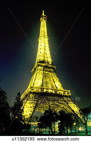 Stock Image -  Paris, Eiffel Tower, France, Europe, The Eiffel Tower illuminated at night in Paris.. Fotosearch
