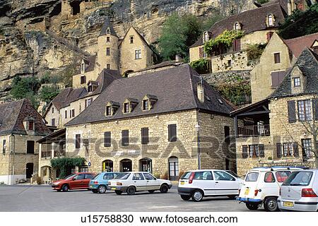 Perigord, France, Dordogne, La Roque Gageac, Aquitaine, Europe, The medieval village of La Roque Gageac is nestled under a limestone cliffs. View Large Photo Image Stock Image - Perigord, France, Dordogne, La Roque Gageac, Aquitaine, Europe, The medieval village of La Roque Gageac is nestled under a limestone cliffs.. Fotosearch