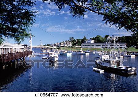 Stock Photo -  Perkins Cove, fishing boats, Ogunquit, Maine, ME, Fishing boats in the harbor of the scenic fishing village of Perkins Cove on the Atlantic Ocean. . Fotosearch