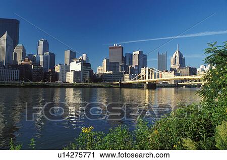 Pittsburgh, skyline, bridge, PA, Pennsylvania, View of the downtown skyline of Pittsburgh and the 9th Street Bridge crossing the Allegheny River. View Large Photo Image Stock Image - Pittsburgh, skyline, bridge, PA, Pennsylvania, View of the downtown skyline of Pittsburgh and the 9th Street Bridge crossing the Allegheny River.. Fotosearch