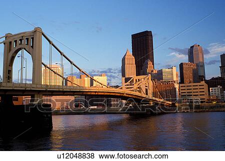 Pittsburgh, skyline, bridge, PA, Pennsylvania, View of the downtown skyline of Pittsburgh and the 9th Street Bridge crossing the Allegheny River. View Large Photo Image Stock Photo - Pittsburgh, skyline, bridge, PA, Pennsylvania, View of the downtown skyline of Pittsburgh and the 9th Street Bridge crossing the Allegheny River.. Fotosearch