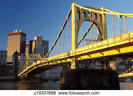 Pittsburgh, skyline, bridge, PA, Pennsylvania, View of the downtown skyline of Pittsburgh and the 7th Street Bridge crossing the Allegheny River. View Large Photo Image Stock Photo - Pittsburgh, skyline, bridge, PA, Pennsylvania, View of the downtown skyline of Pittsburgh and the 7th Street Bridge crossing the Allegheny River.. Fotosearch