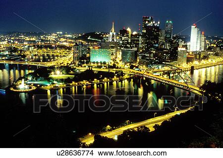 Picture -  Pittsburgh, skyline, PA, Pennsylvania, Aerial reflection of the downtown skyline of Pittsburgh in the Monongahela River at night.. Fotosearch