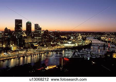 Pittsburgh, skyline, sunrise, PA, Pennsylvania, aerial view of the downtown skyline of Pittsburgh along the Monongahela River at sunrise. View Large Photo Image Stock Image - Pittsburgh, skyline, sunrise, PA, Pennsylvania, aerial view of the downtown skyline of Pittsburgh along the Monongahela River at sunrise.. Fotosearch