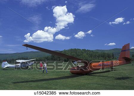 plane, glider, excursion, spring, Warren, VT, Vermont, Glider and small plane on run way at Warren Airport Soaring Center in Warren in the Mad River Valley in the spring. View Large Photo Image Stock Photography - plane, glider, excursion, spring, Warren, VT, Vermont, Glider and small plane on run way at Warren Airport Soaring Center in Warren in the Mad River Valley in the spring. . Fotosearch