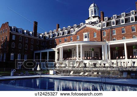 Stock Photo -  pool, resort, Cooperstown, New York, The swimming pool at the Otesaga Resort Hotel in Cooperstown, NY.. Fotosearch