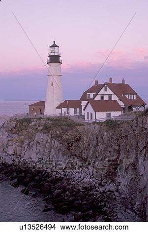 Picture -  Portland Head Light, lighthouse, Cape Elizabeth, Maine, ME, Portland Head Light on Cape Elizabeth at sunset in Fort Williams Park on the Atlantic Ocean. . Fotosearch