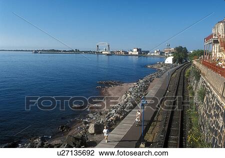 railroad, train, Duluth, MN, Minnesota, North Shore Scenic Railroad and recreation path along Lake Superior in Duluth. View Large Photo Image Stock Image - railroad, train, Duluth, MN, Minnesota, North Shore Scenic Railroad and recreation path along Lake Superior in Duluth.. Fotosearch