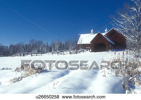 Stock Photo -  red barn, farm, winter, Marshfield, Vermont, VT, Red barn on a farm in the snow on sunny day in winter in Marshfield.. Fotosearch