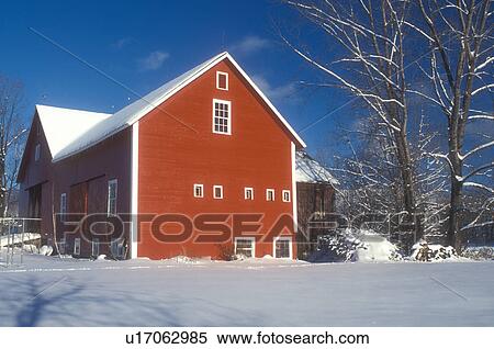 Stock Photography -  red barn, winter scene, snow, Vermont, A red barn in the snow under a clear blue sky in winter in Underhill in Chittenden County in the state of Vermont. . Fotosearch