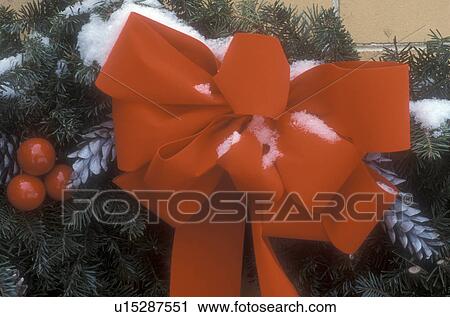 red bow, ribbon, decoration, wreaths, holiday, close-up, winter, A close-up view of a snow covered red bow/ribbon on a Christmas wreath. View Large Photo Image Stock Image - red bow, ribbon, decoration, wreaths, holiday, close-up, winter, A close-up view of a snow covered red bow/ribbon on a Christmas wreath.. Fotosearch