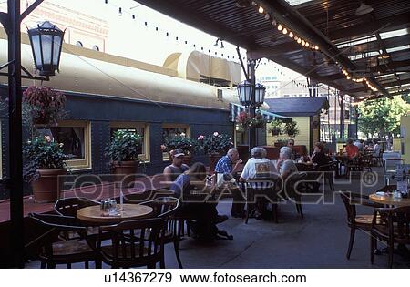 Stock Photo -  restaurant, cafT, Omaha, NE, Nebraska, CafT at the Historic Old Market in downtown Omaha.. Fotosearch