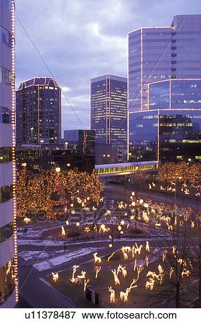 Stock Photo -  Richmond, VA, Virginia, Christmas decorations at 12th and Cary Streets in downtown Richmond in the evening.. Fotosearch