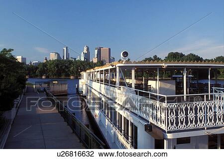 riverboat, Minneapolis, MN, Minnesota, Twin Cities, Riverboats at Boom Island Park along the Mississippi River. Downtown skyline in the background. View Large Photo Image Stock Image - riverboat, Minneapolis, MN, Minnesota, Twin Cities, Riverboats at Boom Island Park along the Mississippi River. Downtown skyline in the background.. Fotosearch